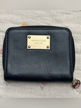 Michael Kors black pebbled leather zip-around wallet